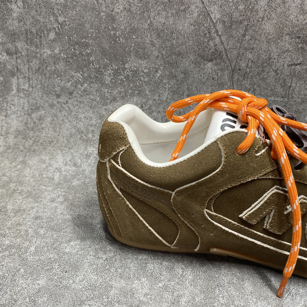 UA Miu Miu x New Balance 530 SL suede sneakers