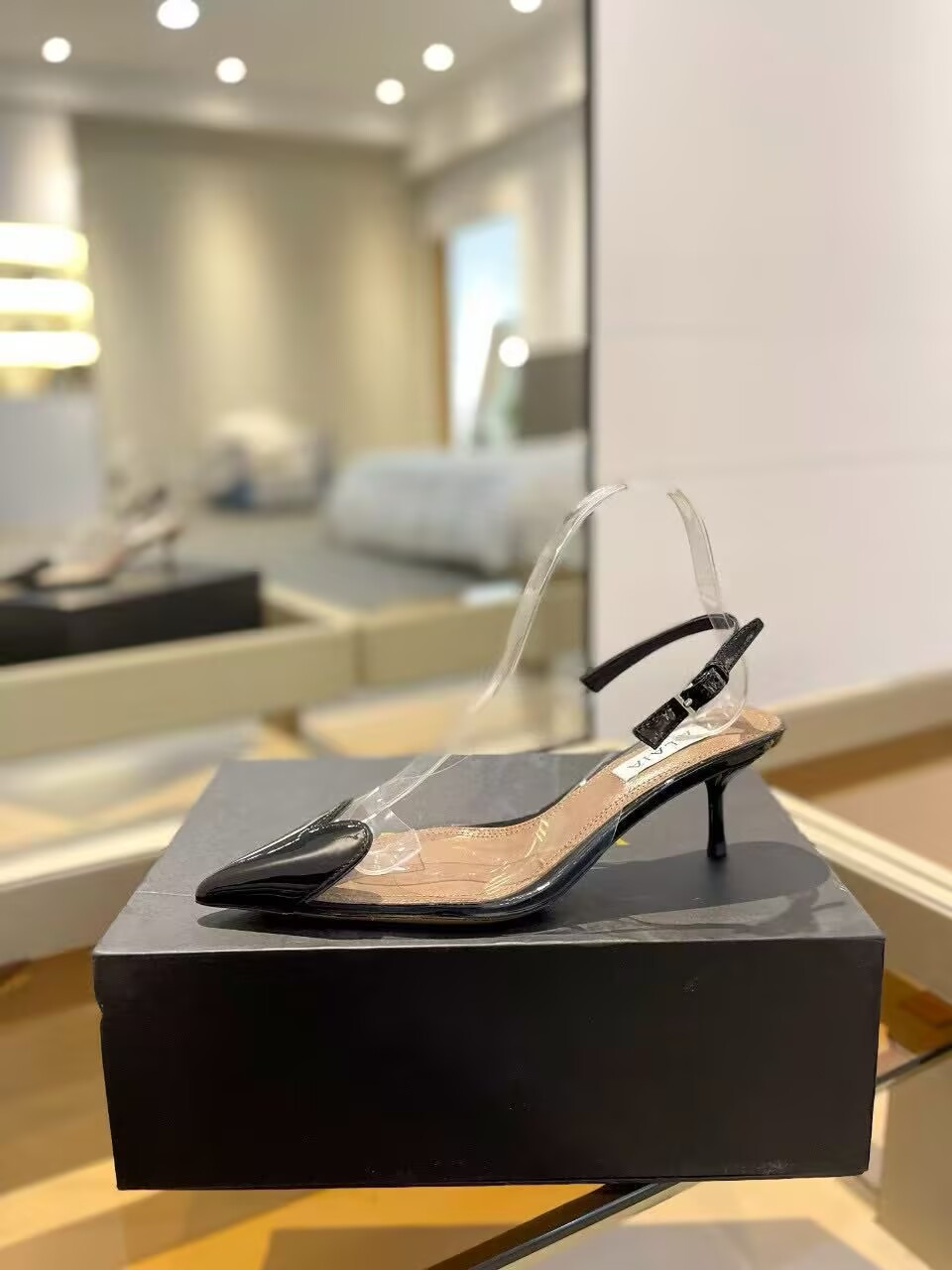 UA ALAÏA Le Coeur Plexi Heart-Toe Slingback Pump