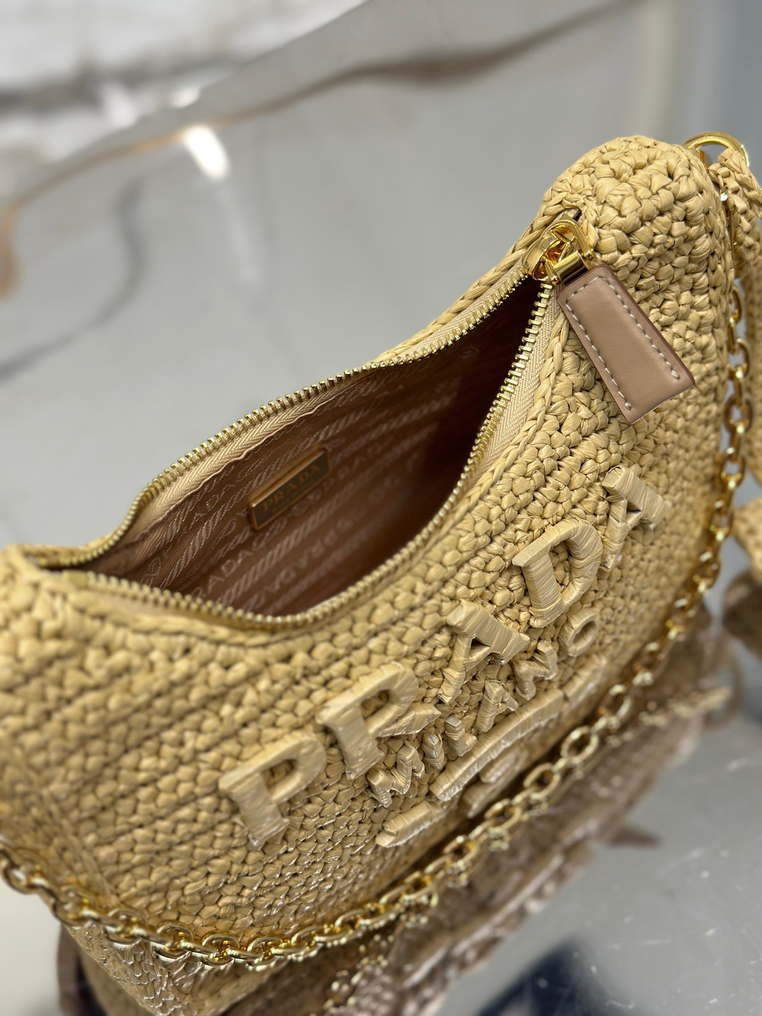 Pra*a re-edition crochet mini-bag color natural