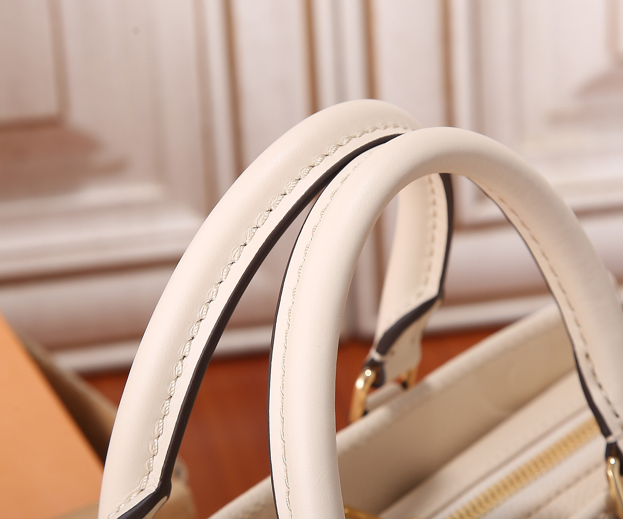 LV OnTheGo East West M23698 9.8 x 5.1 x 3.9 inches