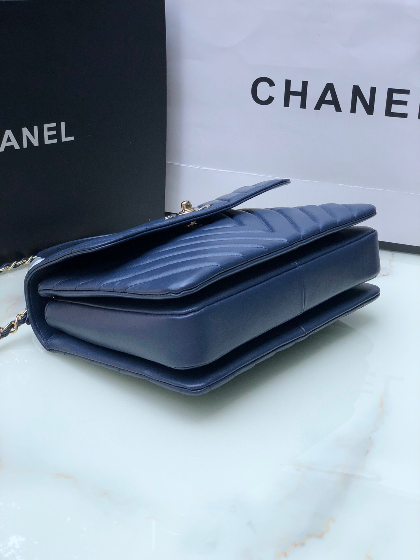 Ch*el flap bag with top handle navy 6.6 × 9.8 × 4.7 in
