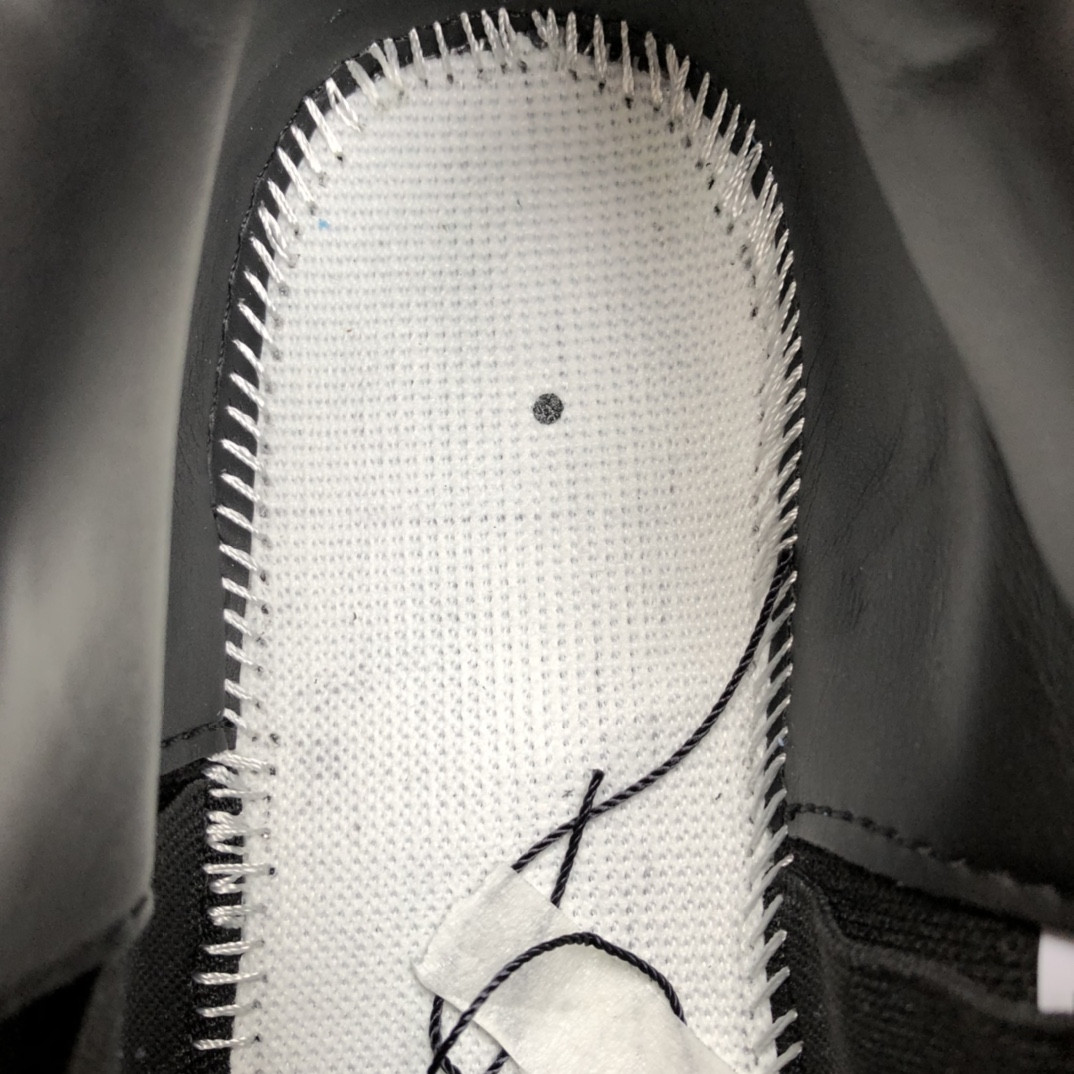 UA Jordan 4 Retro Kaws Black