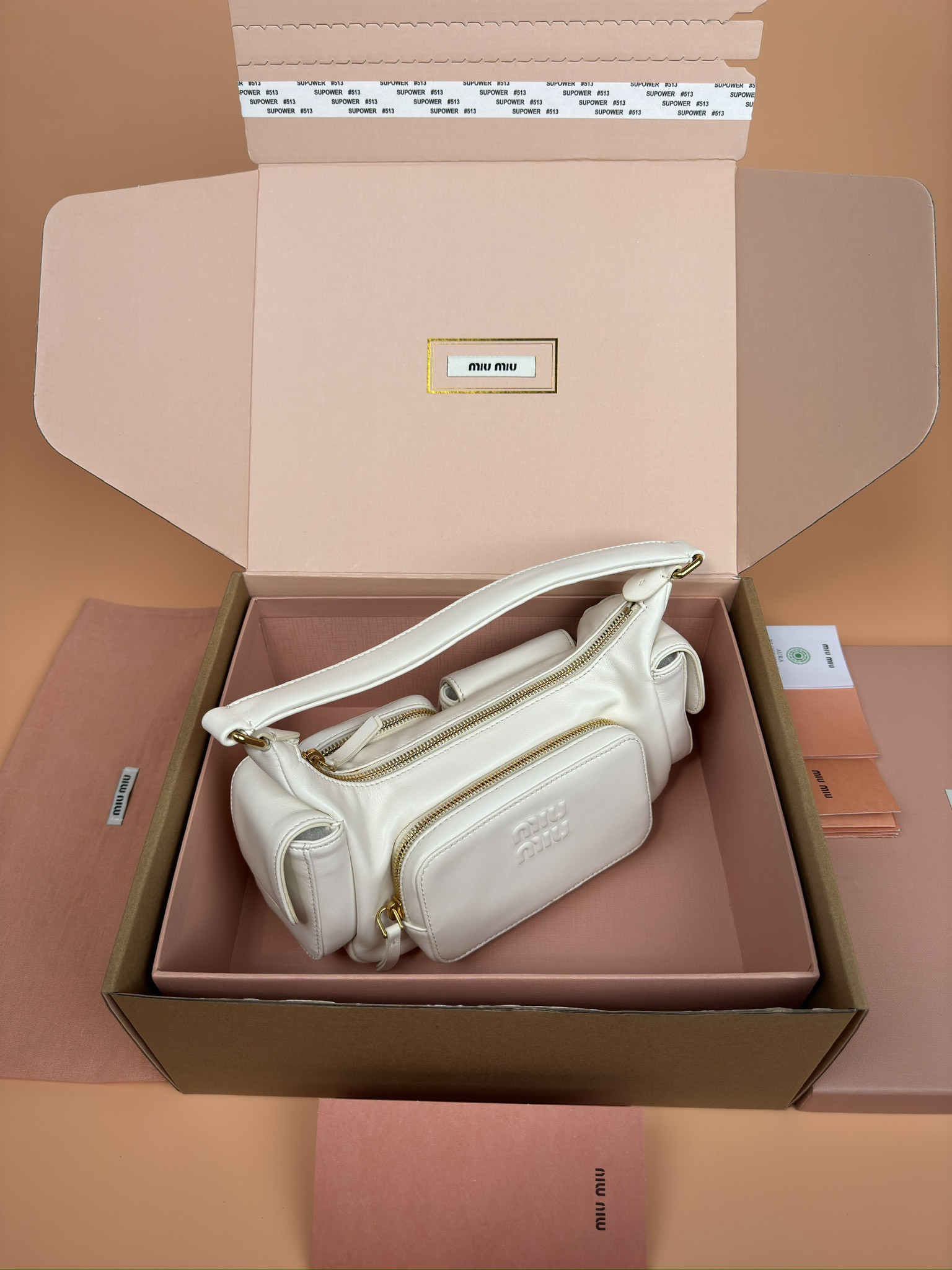 Miu Miu Hobo Nappa leather pocket bag  12x21x6cm